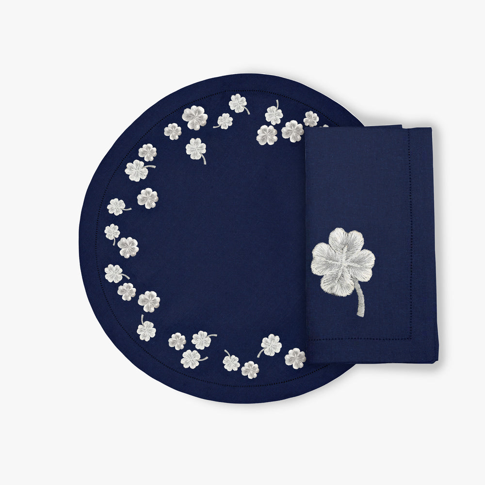 
                  
                    Silver Clovers Round Placemat - Navy
                  
                