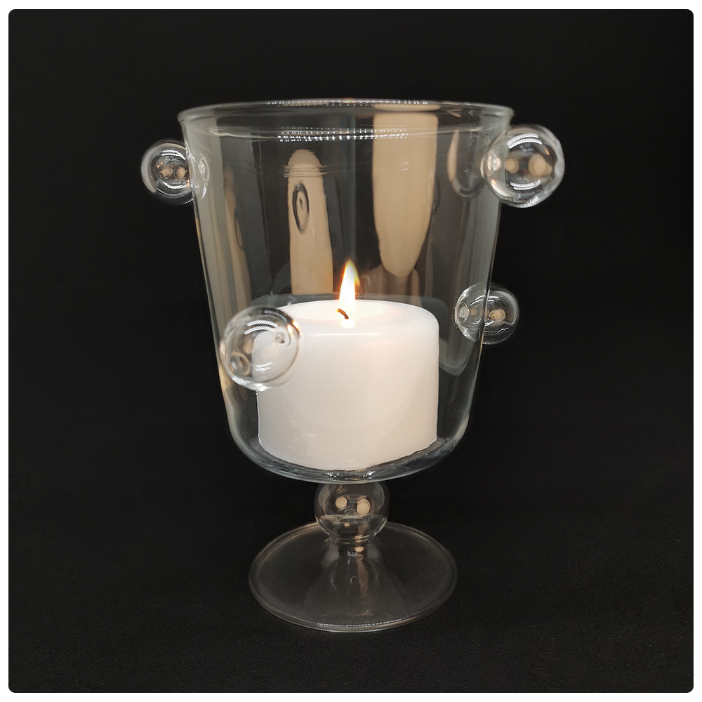 Transparent candle holder